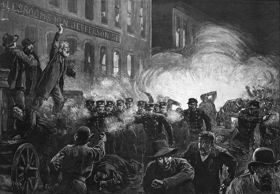 Cadre représentant l'image d'une manifestation ouvrière.  Le nom du tableau est : Massacre de Haymarket le 1er mai 1886. 